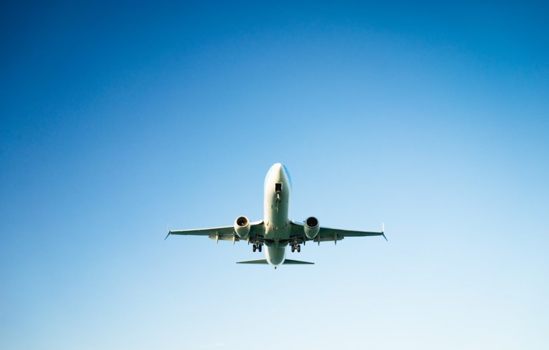 passenger plane taking off composition