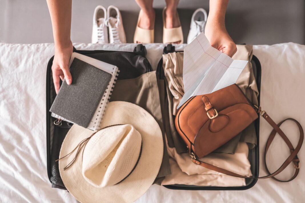 Travel. Staycation.local travel new normal.Girl traveler packing luggage in suitcase Travel,tourism, Travel. Staycation.local travel new normal.Girl traveler packing luggage in suitcase Travel,tourism,